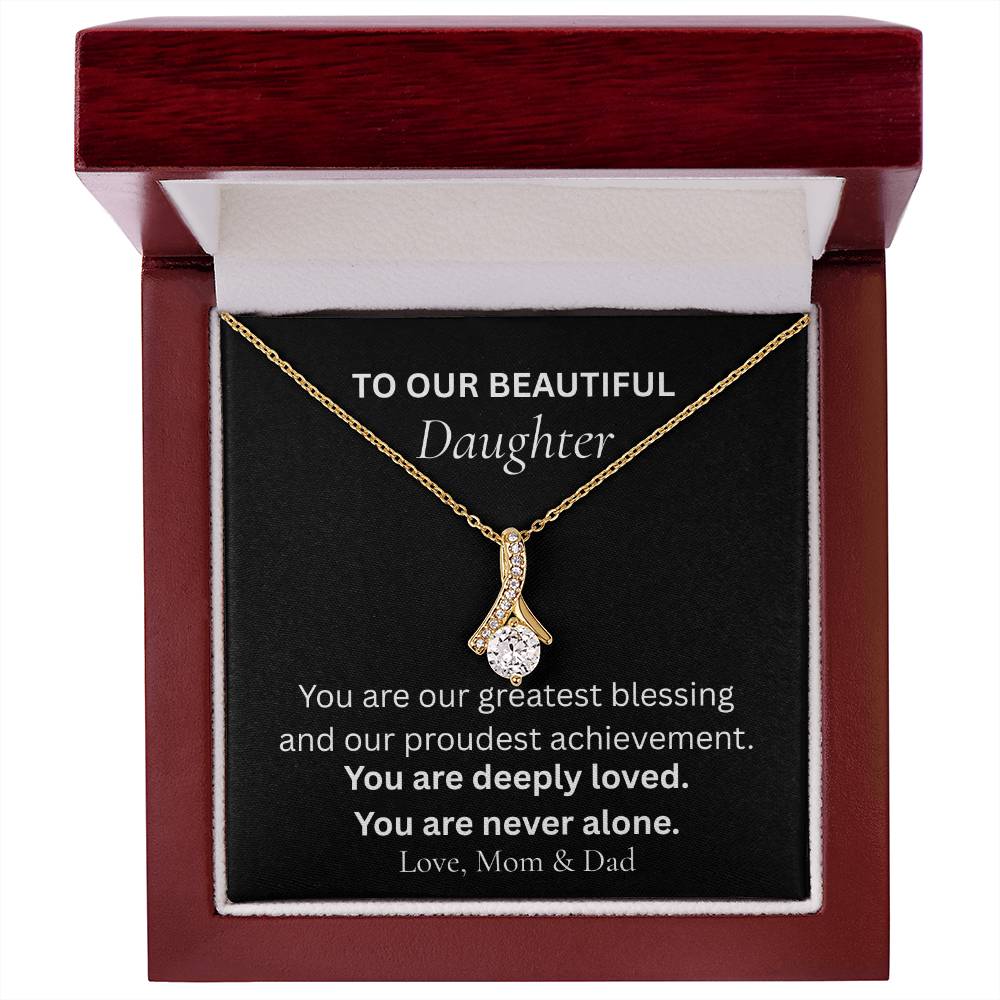 Alluring Beauty Necklace with message card reading “To Our Beautiful Daughter, you are deeply loved,” luxury gift from Mom and Dad