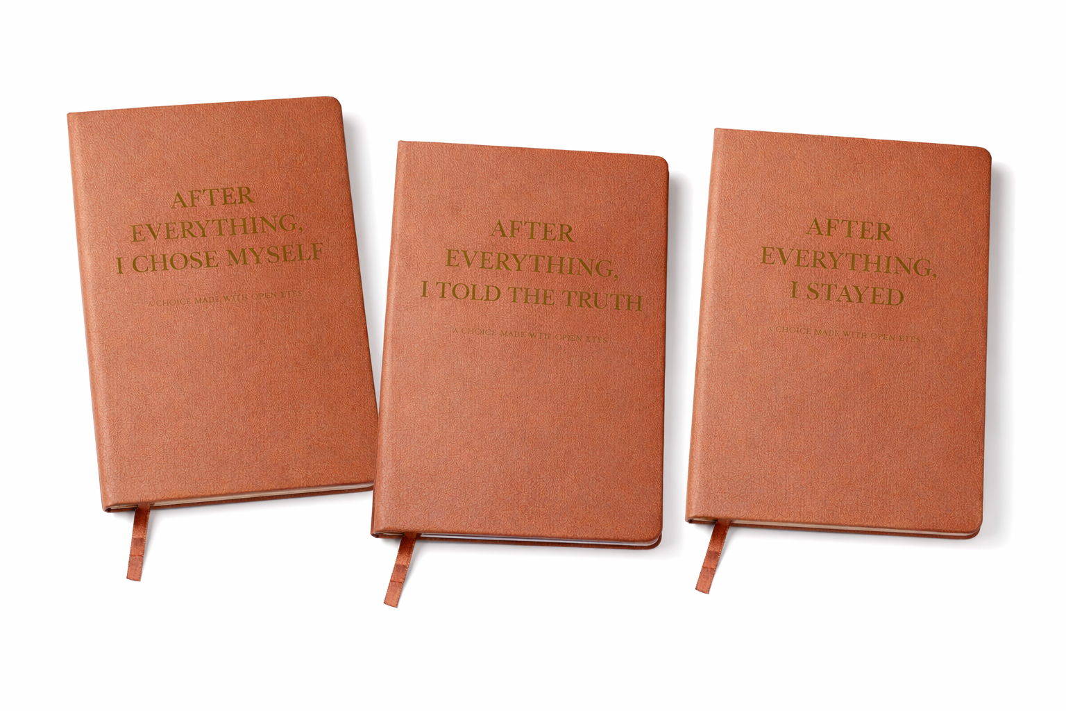 Three brown vegan leather healing journals from the After Everything Collection featuring I Chose Myself, I Told the Truth, and I Stayed.