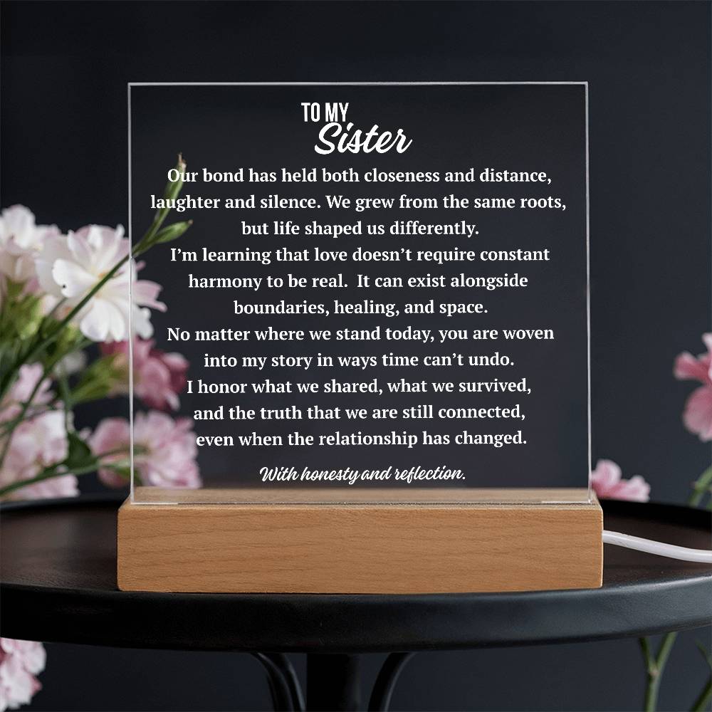 To My Sister complex love acrylic plaque with heartfelt message displayed on a wooden base