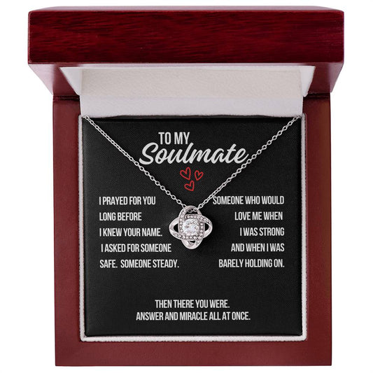 To My Soulmate love knot necklace with prayer message card in luxury gift box with black background.
