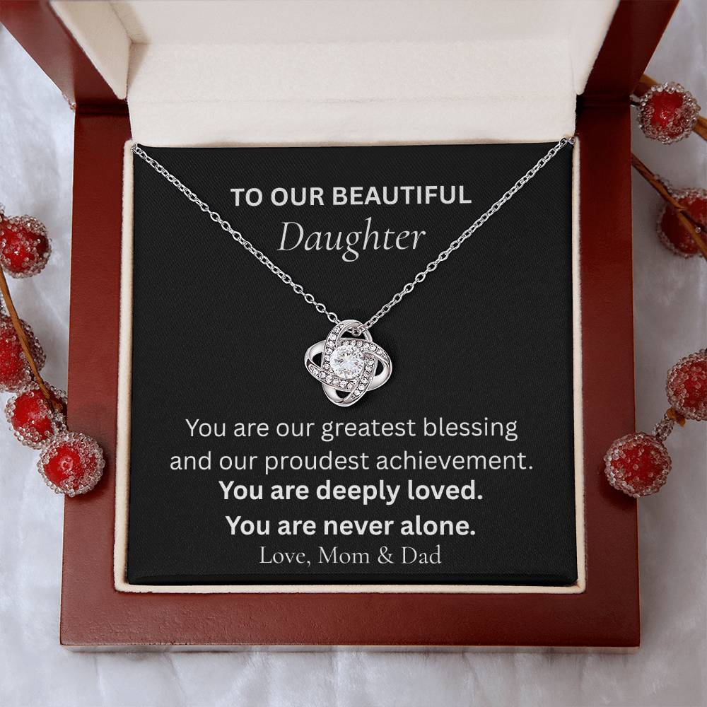 Love Knot necklace for daughter from mom and dad displayed in luxury gift box with heartfelt message card