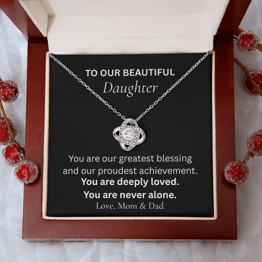 Love Knot necklace for daughter from mom and dad displayed in luxury gift box with heartfelt message card