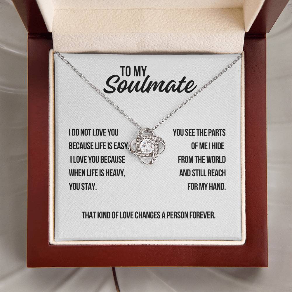 To my soulmate white gold love knot necklace on white background with message about staying when life is heavy and love changing a person forever